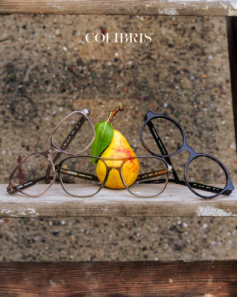 Drei Colibris-Fassungen, Alvi, Anuk und Alina, um eine Birne gelegt